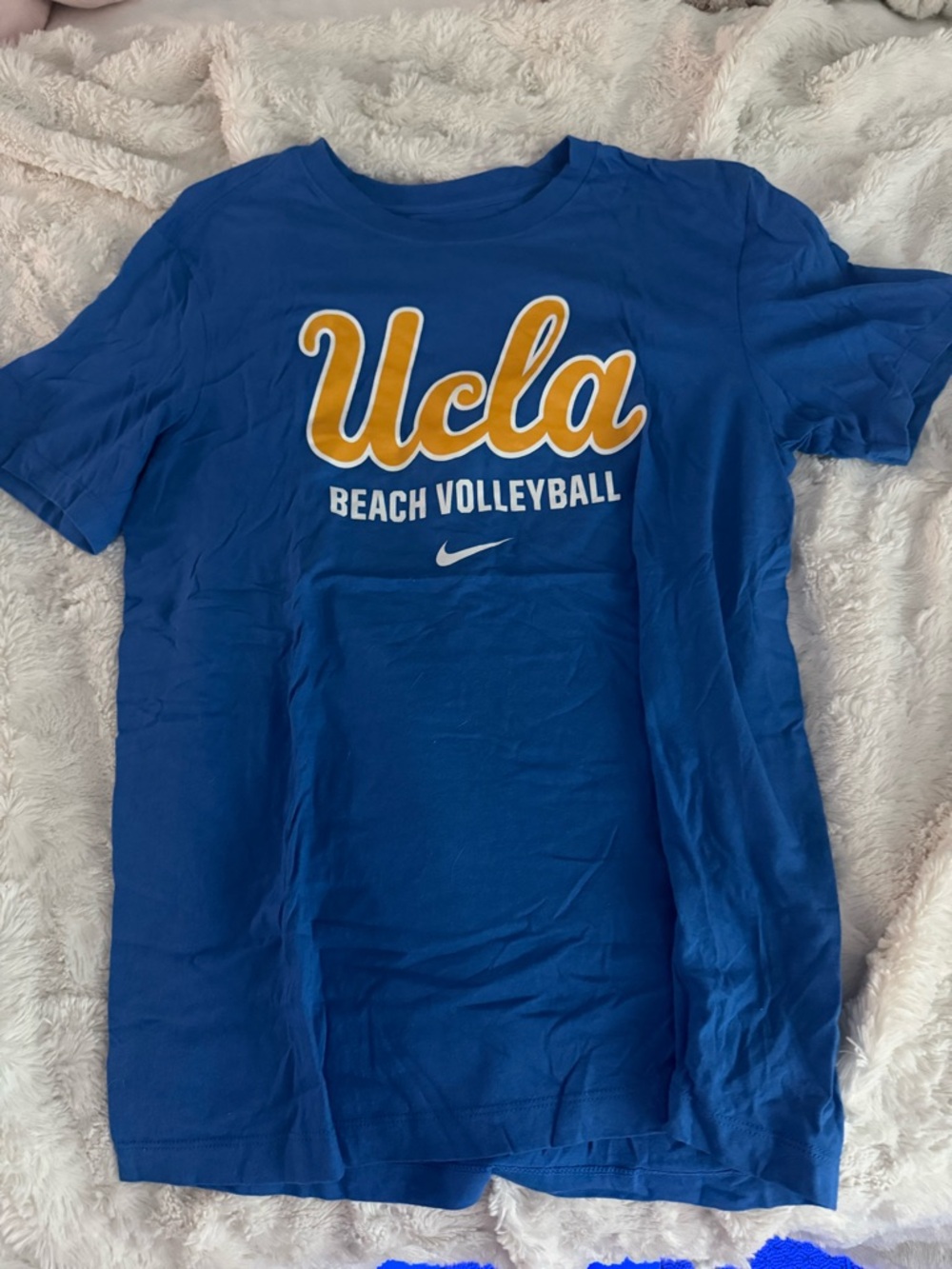 Nike Blue Tee with White Logo and Yellow Accent